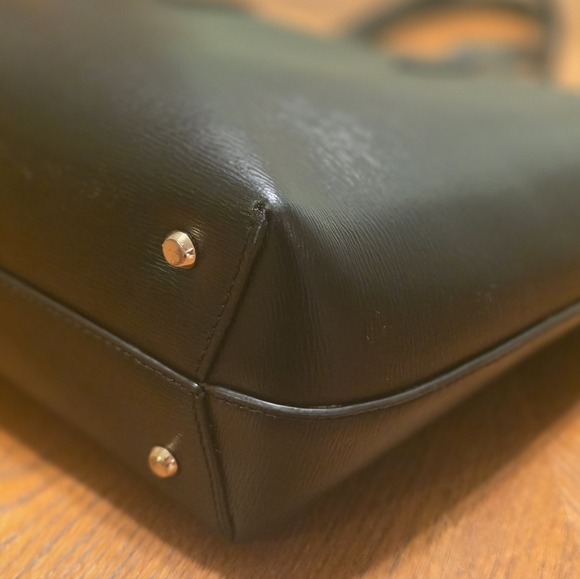 DKNY Bryant Medium Zippered Tote Bag in black leather with gold-tone hardware.  - Picture 10 of 17